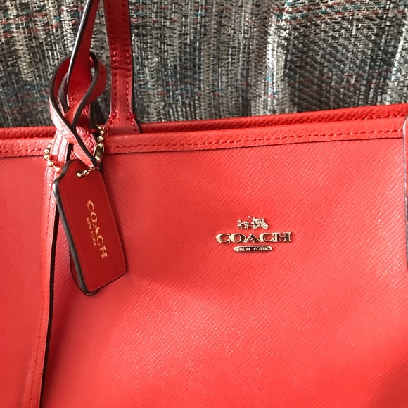 Coach Salmon and fuchsia reversible tote. - Picture 2 of 10